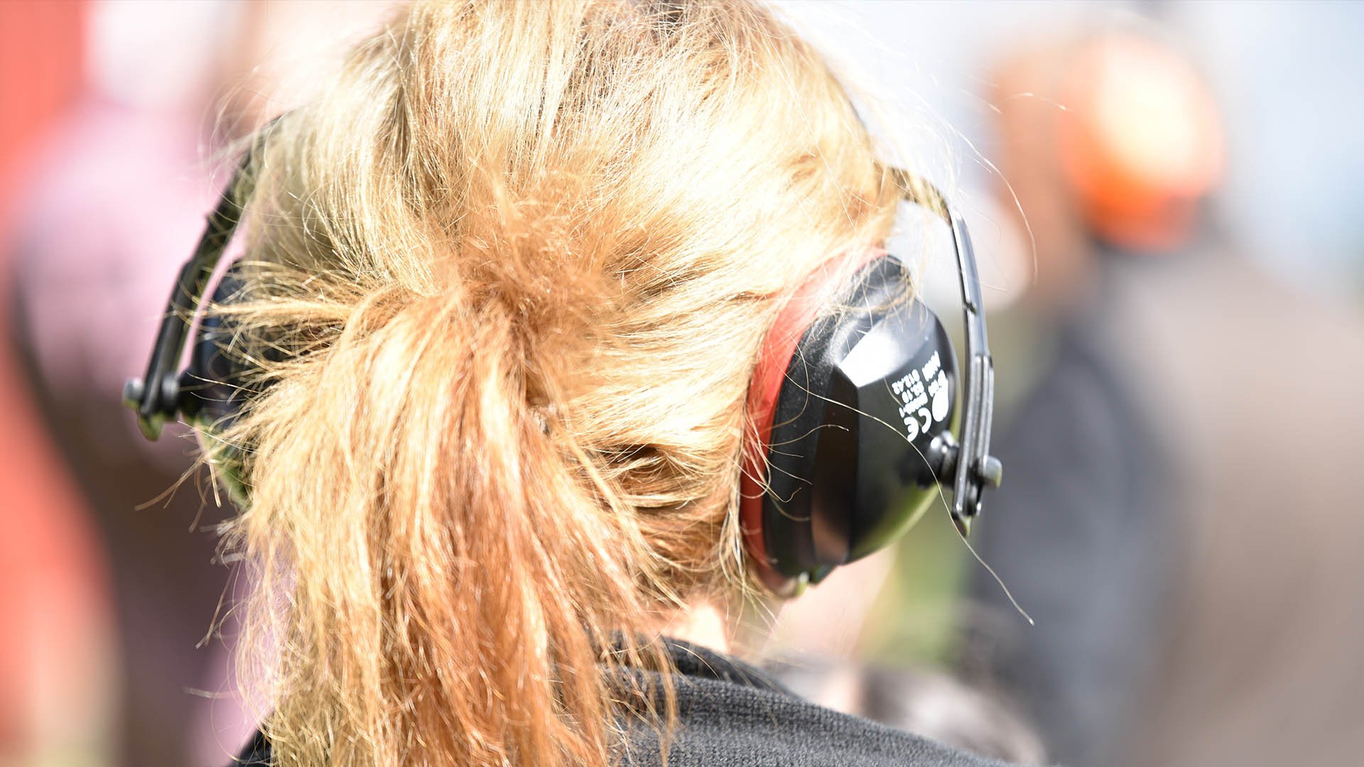 woman wearing ear protection