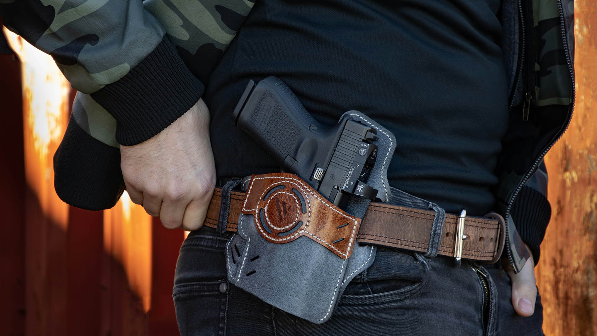 Man adjusting belt holster