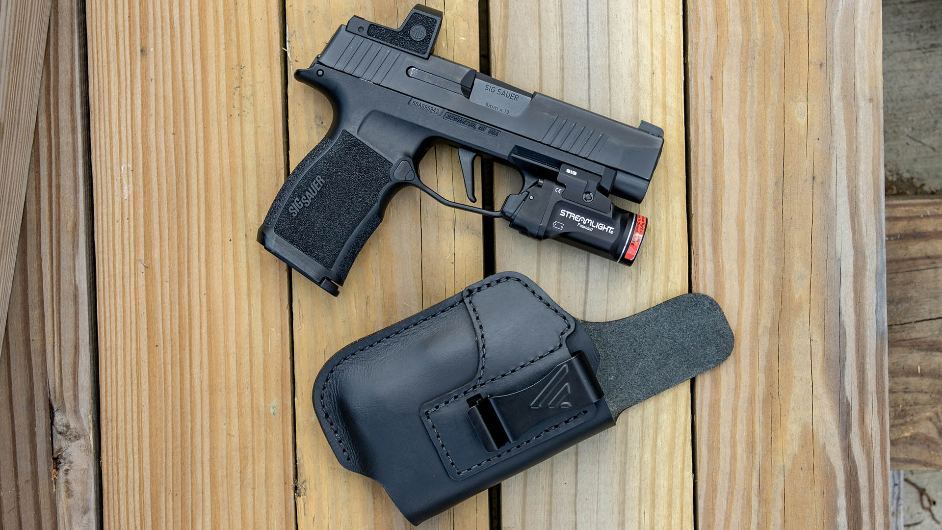 Sig Sauer P365 with tactical gun accessories