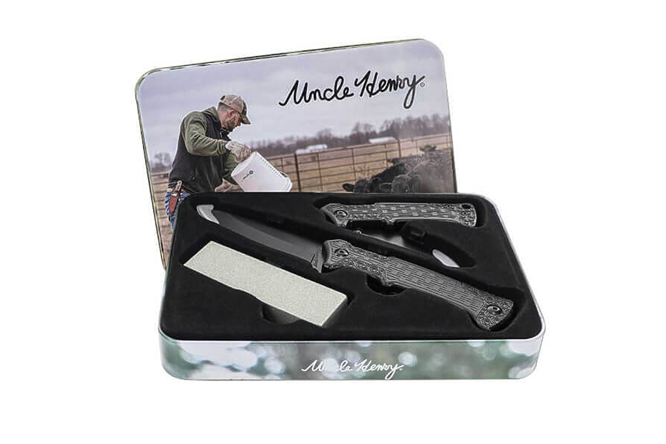 Smith & Wesson/Battenfeld Uncle Henry Midnight Tin With Sharpening Stone