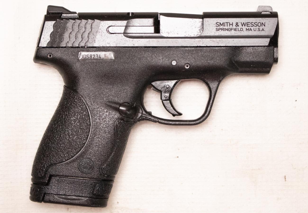 Smith & Wesson M&P9 Shield  9mm Police Trade-In Semi-Auto Pistol with Finger Rest Magazine