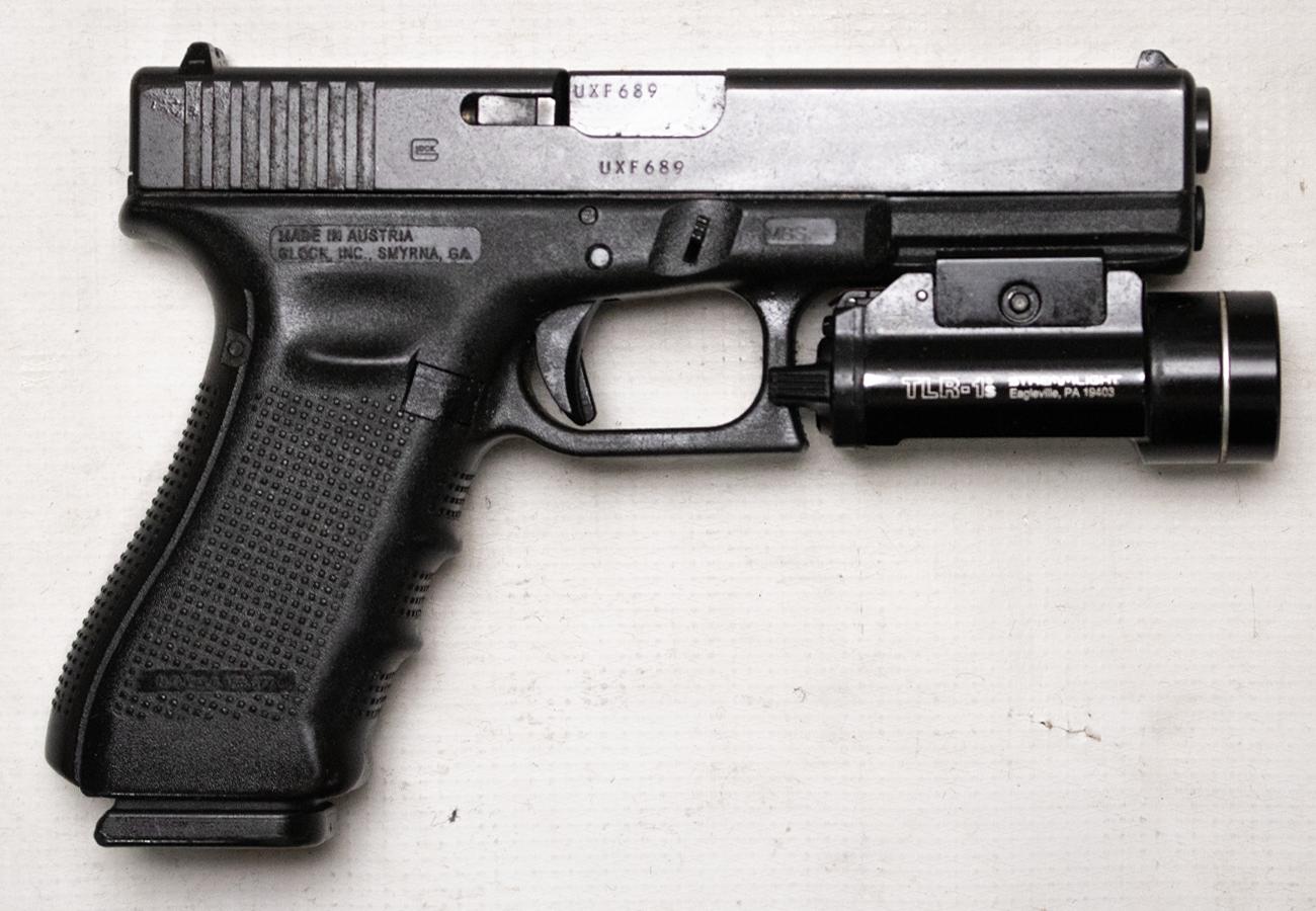 Glock 22 Gen4 40 S&W Police Trade-in Pistol with TLR-1s Weapon Light