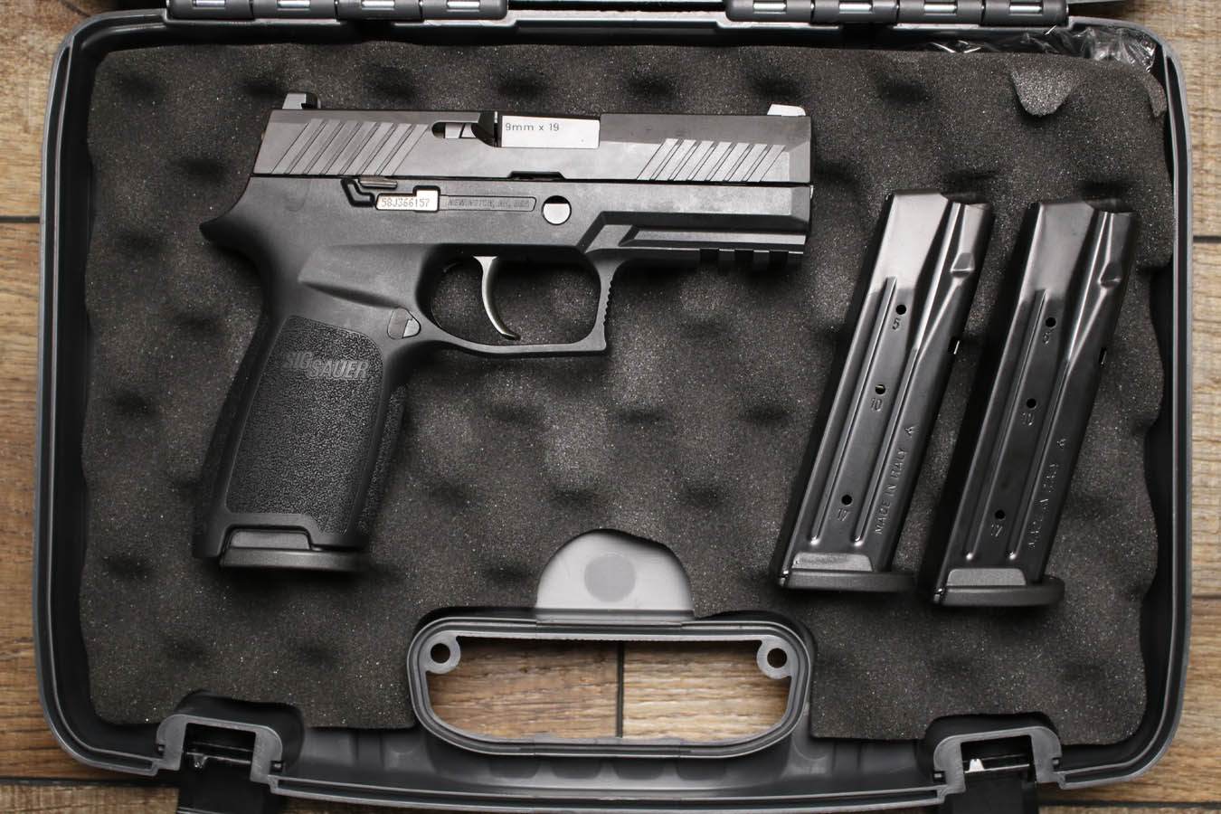 Sig Sauer P320 Carry 9mm Police Trade-in Pistol with Night Sights and Three Magazines (New in Box Condition)