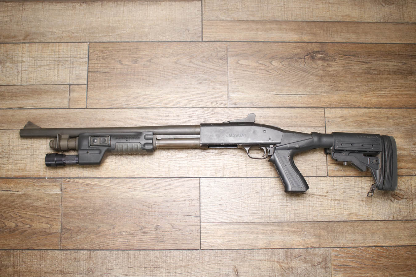 Mossberg M590A1 12GA Police Trade-In Shotgun with SureFire Foreend