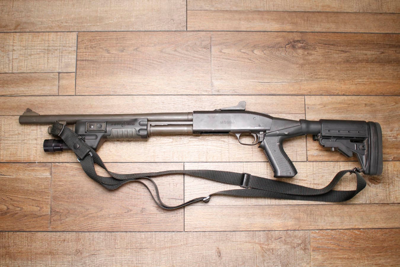 Mossberg M590A1 12GA Police Trade-In Shotgun with SureFire Flashlight