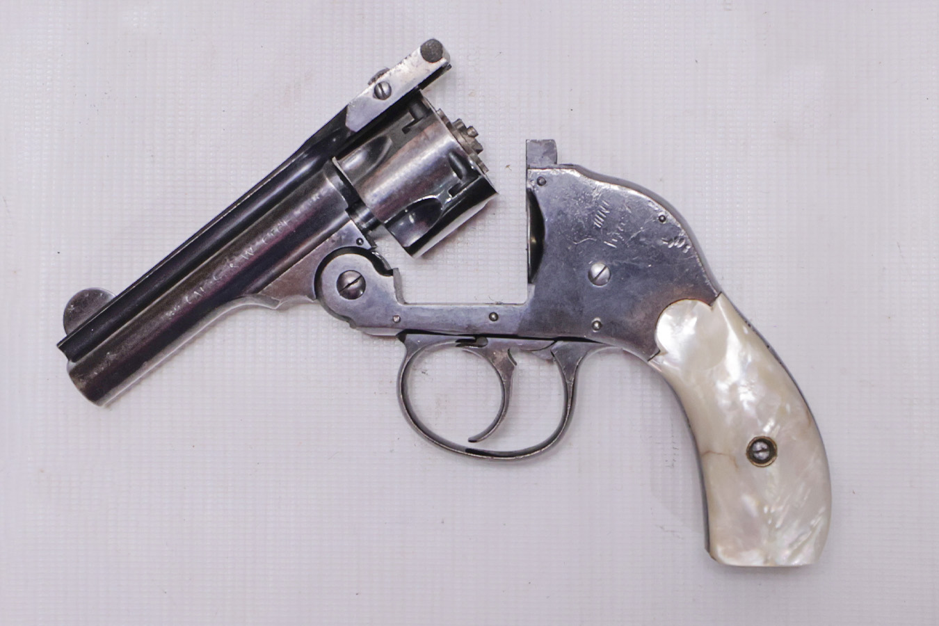 H AND R Top Break 32 SW Trade-In Revolver with Pearl Grips