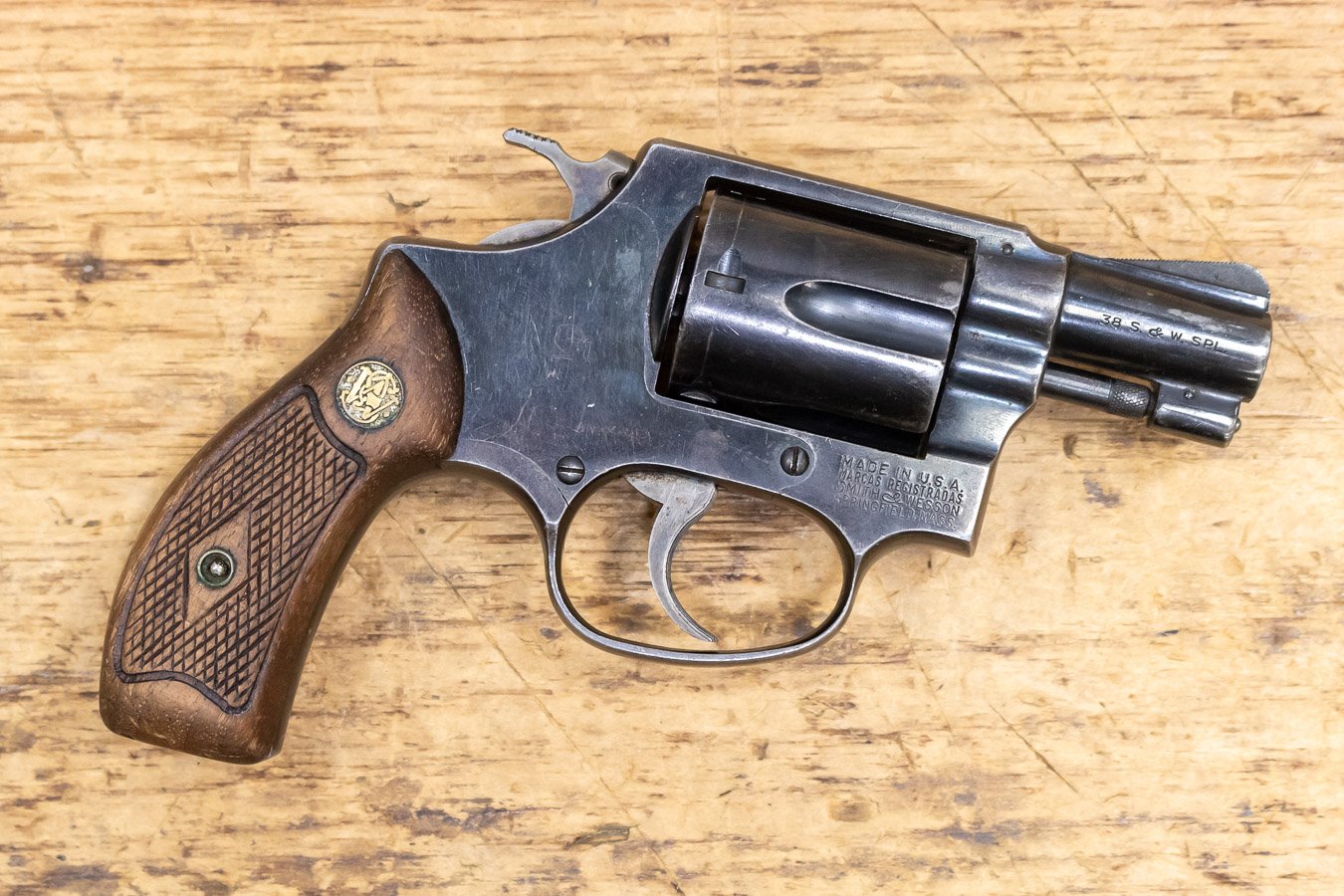 SMITH AND WESSON Model 36 38 Special Blued Revolver with Wood Diamond Grips (Mfg. 1958-61)