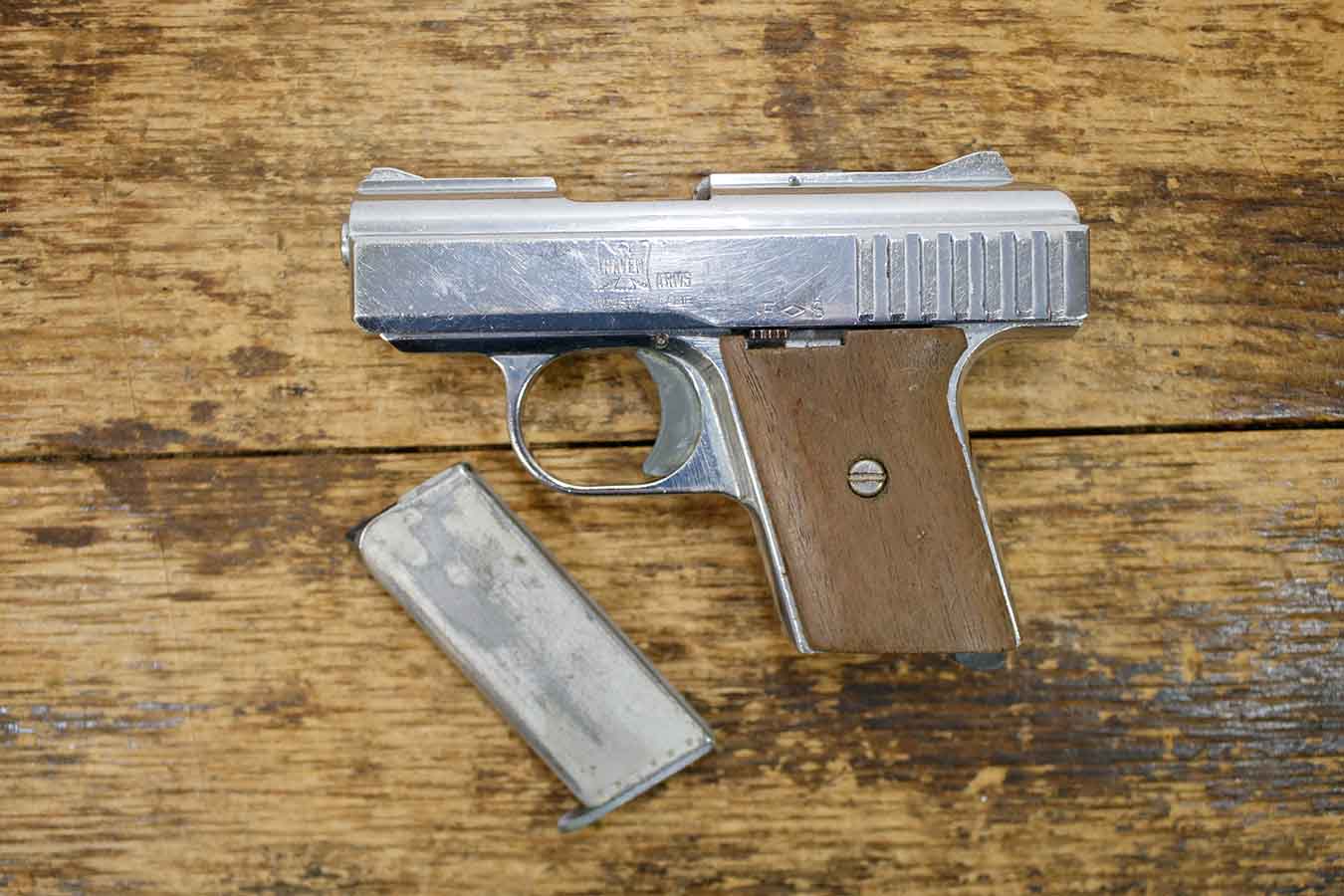 RAVEN ARMS P-25 25 Auto Police Trade-In Pistol with Wood Grips