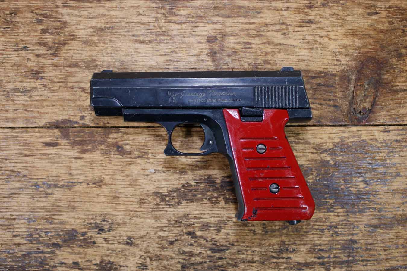 BRYCO 59 9mm Police Trade-In Pistol with Red Grips (Magazine Not Included)