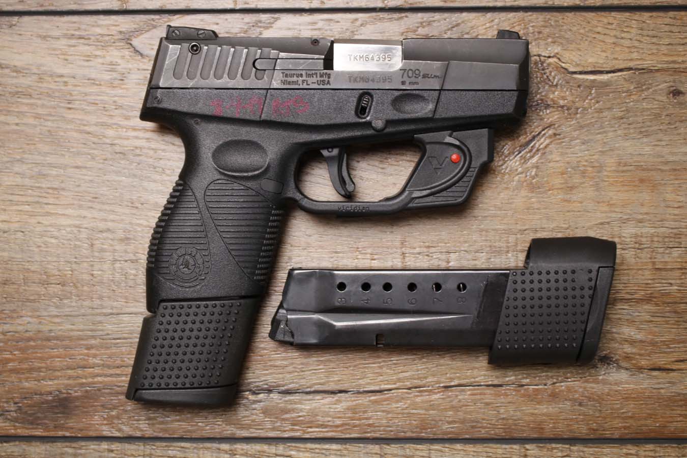 TAURUS PT709 Slim 9mm Police Trade-In Pistol with Laser