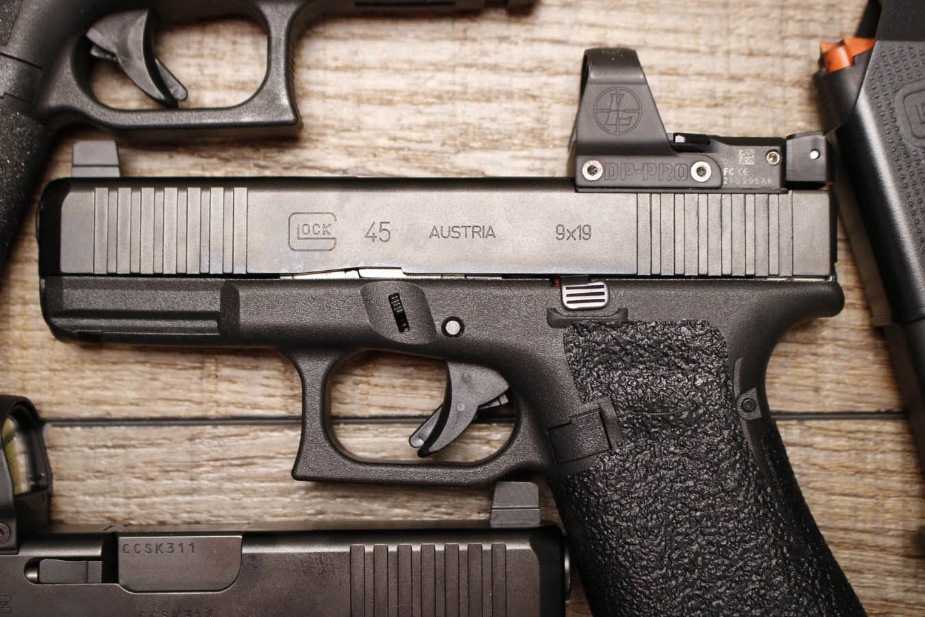 GLOCK 45 9mm Police Trade-In Pistol with Stippled Grips, Night Sights and LeupoldDelta Point Pro Red Dot (Very Good Condition)