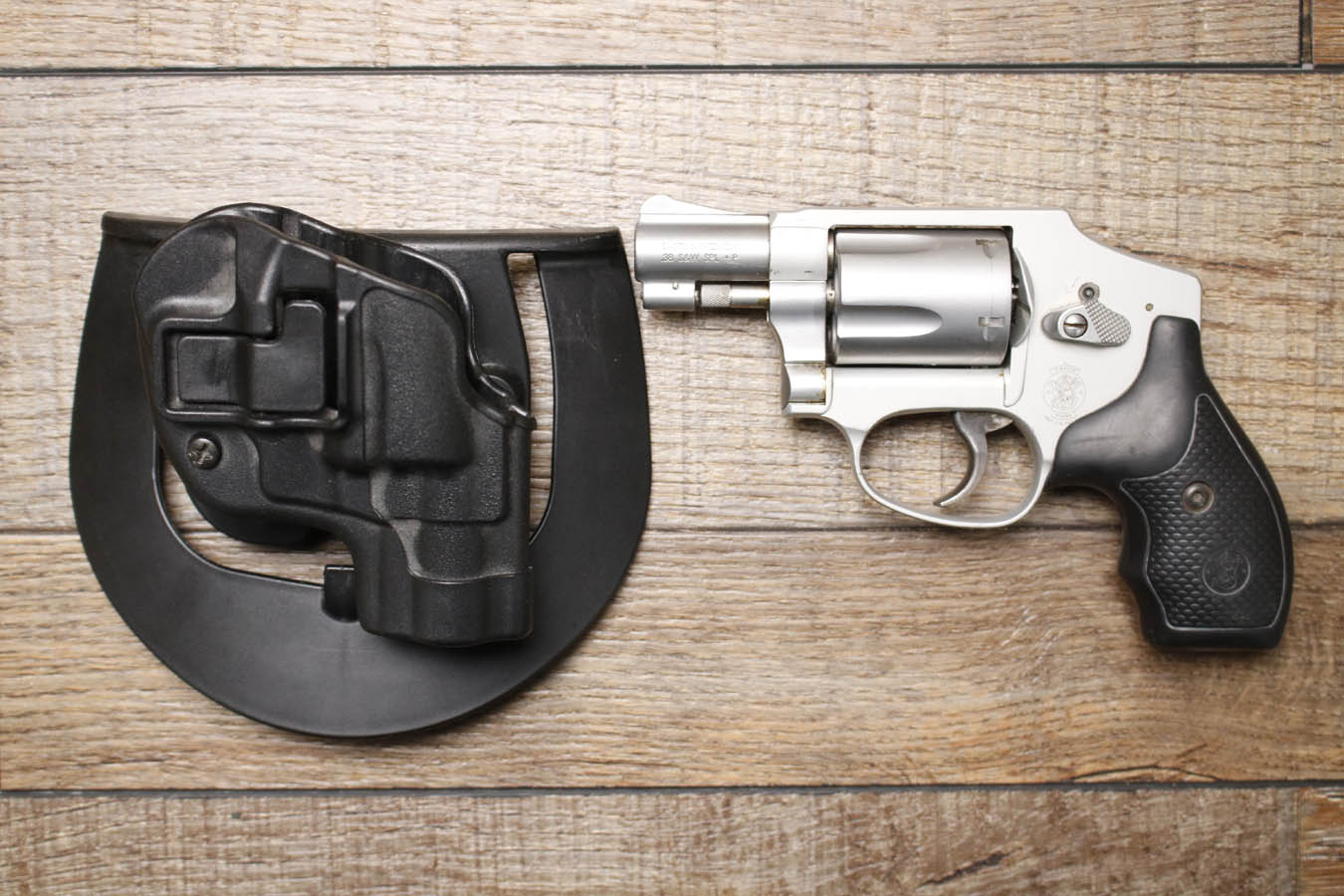 SMITH AND WESSON 642-2 38SW SPL +P Police Trade-In Revolver with Holster and Beavercreek OH PD Insignia