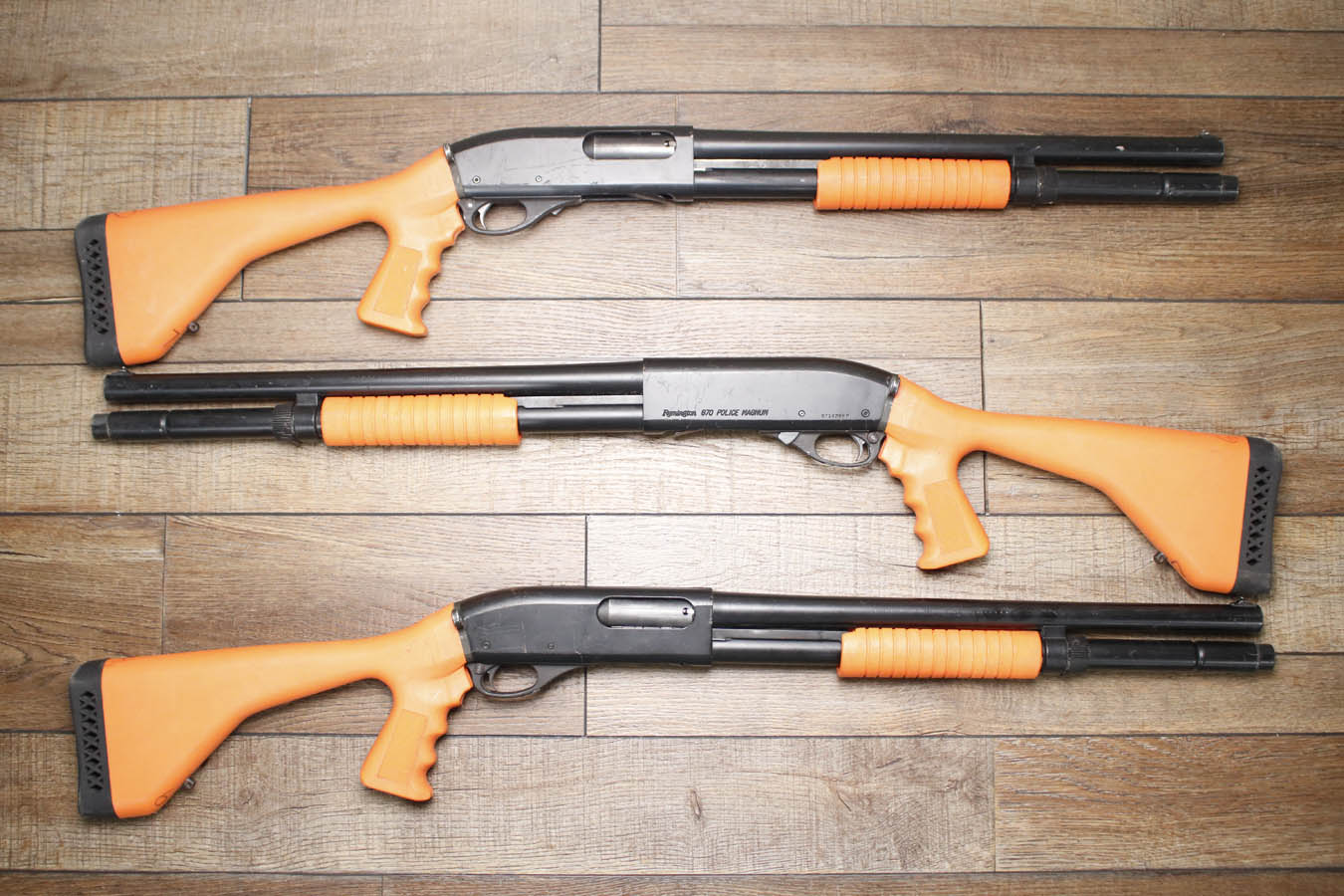 REMINGTON 870 Police Magnum 12GA Police Trade-In Shotgun with Synthetic Orange Furniture18 Inch Barrel and Extended Mag Tube