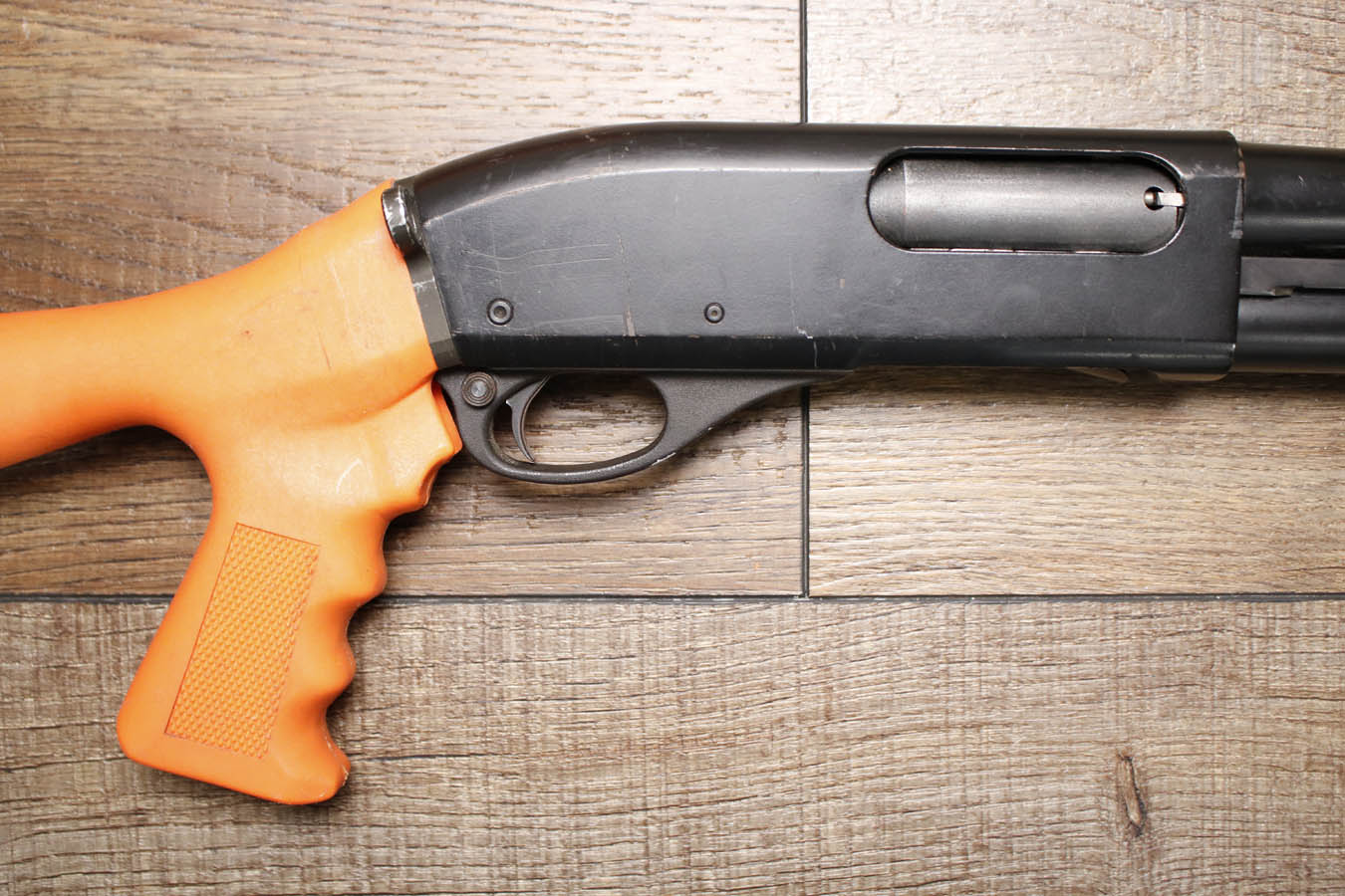 REMINGTON 870 Police Magnum 12GA Police Trade-In Shotgun with Synthetic Orange Furniture18 Inch Barrel and Extended Mag Tube